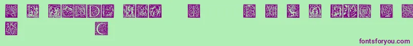 Barockcaps Font – Purple Fonts on Green Background