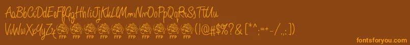Police AngeliqueRoseFontFfp – polices orange sur fond brun