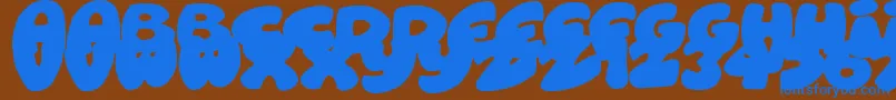 RoundishToons Font – Blue Fonts on Brown Background