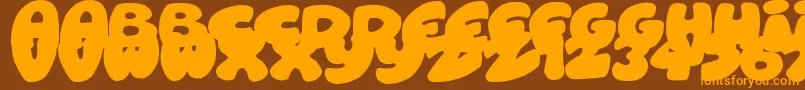 RoundishToons Font – Orange Fonts on Brown Background