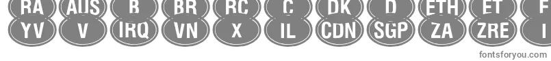 フォントKkodes – 白い背景に灰色の文字