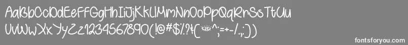 フォントBehindGreenEyesTtf – 灰色の背景に白い文字
