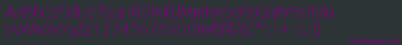 Czcionka ScoginRegular – fioletowe czcionki na czarnym tle