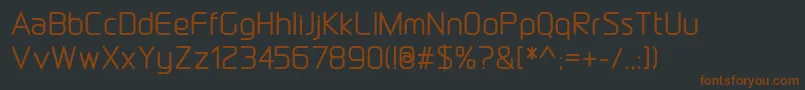 Шрифт DraftwerkMedium – коричневые шрифты на чёрном фоне