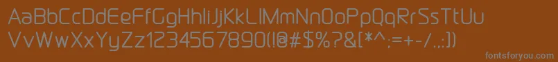Шрифт DraftwerkMedium – серые шрифты на коричневом фоне