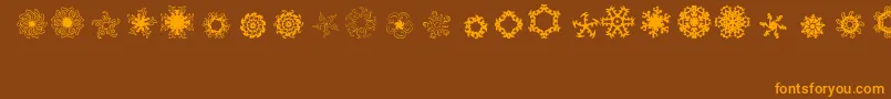 Ladoodles4 Font – Orange Fonts on Brown Background