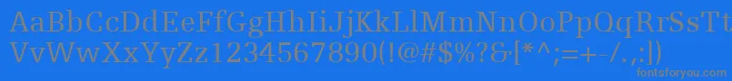 EgyptienneFLt55Roman-Schriftart – Graue Schriften auf blauem Hintergrund