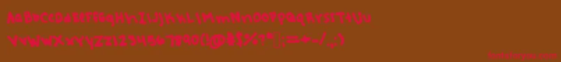 フォントRebeccashandwriting – 赤い文字が茶色の背景にあります。