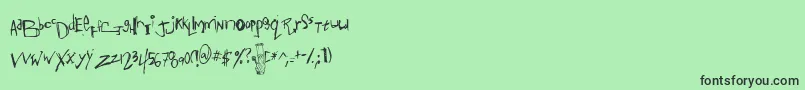フォントAnotms – 緑の背景に黒い文字