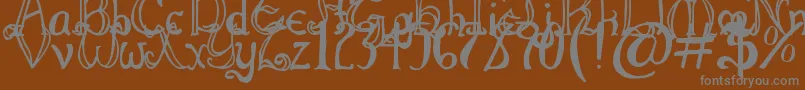 フォントThrorianFormal – 茶色の背景に灰色の文字