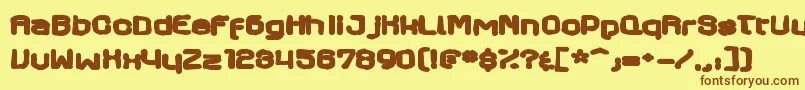 More about Axaxaxink Font Axaxaxink Font – Brown Fonts on Yellow Background