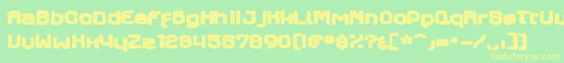 Fonte Axaxaxink – fontes amarelas em um fundo verde