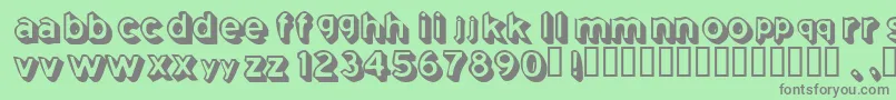 Comingsoon Font – Gray Fonts on Green Background