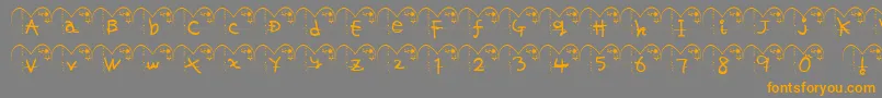 フォントHaFont – オレンジの文字は灰色の背景にあります。