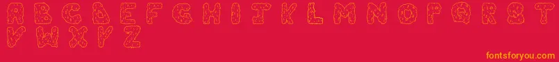 Drippingcool-Schriftart – Orangefarbene Schriften auf rotem Hintergrund