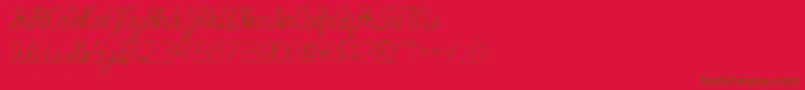 SmileAtFace-Schriftart – Braune Schriften auf rotem Hintergrund