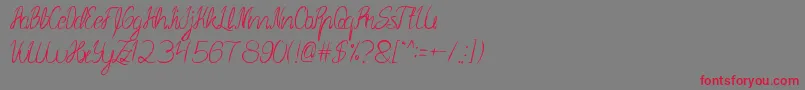 SmileAtFace Font – Red Fonts on Gray Background