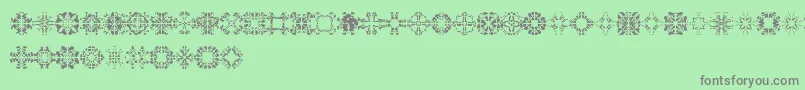 Fonte Abracadabra1 – fontes cinzas em um fundo verde