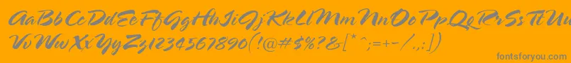 Bustamalaka-Schriftart – Graue Schriften auf orangefarbenem Hintergrund