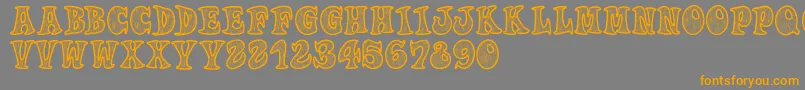 Woodys Font – Orange Fonts on Gray Background