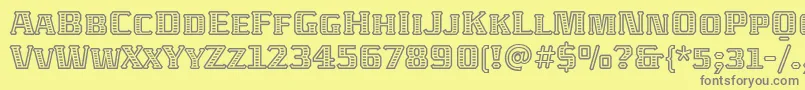 AbatonitcTt-fontti – harmaat kirjasimet keltaisella taustalla