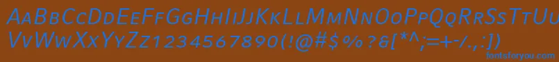 Шрифт CompatilFactLtComItalicSmallCaps – синие шрифты на коричневом фоне