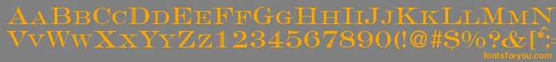 フォントGravureromanRegularDb – オレンジの文字は灰色の背景にあります。