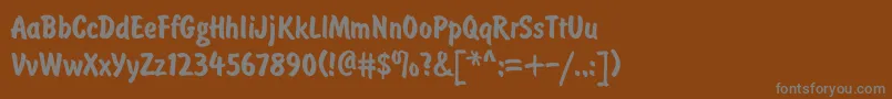 BrushtypeBold Font – Gray Fonts on Brown Background