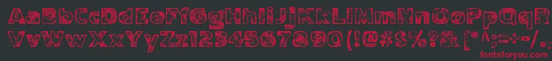 フォントPakenhamwoodRegular – 黒い背景に赤い文字