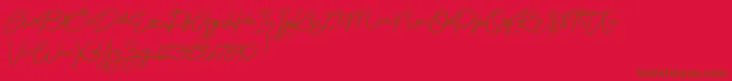 Fonte Beautydemo – fontes marrons em um fundo vermelho