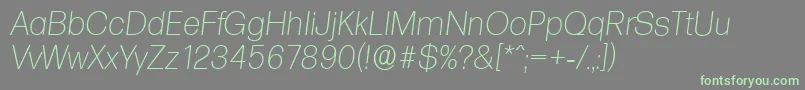 Fonte FormulaserialXlightItalic – fontes verdes em um fundo cinza