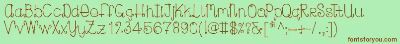 Curlylou Font – Brown Fonts on Green Background