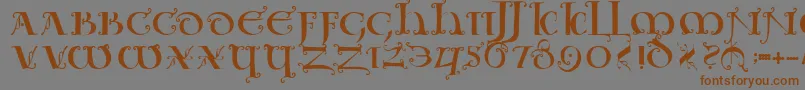 Uncialeornamentale Font – Brown Fonts on Gray Background