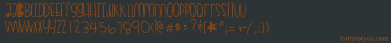 Coralskittles Font – Brown Fonts on Black Background