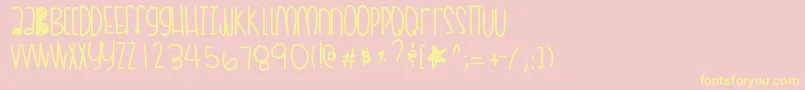 Coralskittles-fontti – keltaiset fontit vaaleanpunaisella taustalla