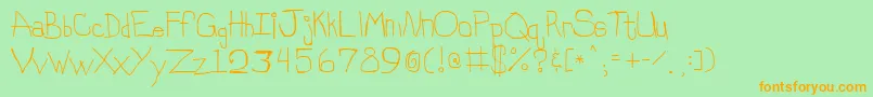 フォントStinky – オレンジの文字が緑の背景にあります。