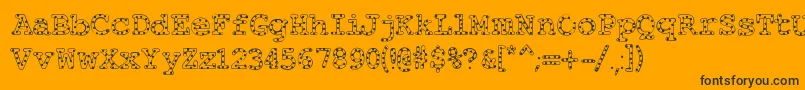 Alphabeticsprinkles-Schriftart – Schwarze Schriften auf orangefarbenem Hintergrund