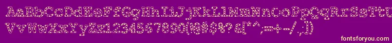 Fonte Alphabeticsprinkles – fontes amarelas em um fundo roxo