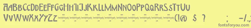 フォントDkHimmelblau – 黄色の背景に灰色の文字