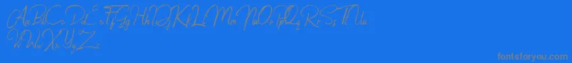 Jacklyne-Schriftart – Graue Schriften auf blauem Hintergrund