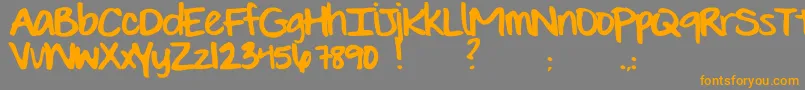 フォントEvieSHand – オレンジの文字は灰色の背景にあります。