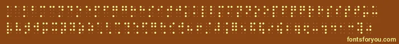 Brailleslo8dot-fontti – keltaiset fontit ruskealla taustalla