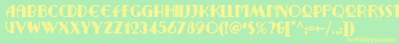 フォントRitzyremixnf – 黄色の文字が緑の背景にあります