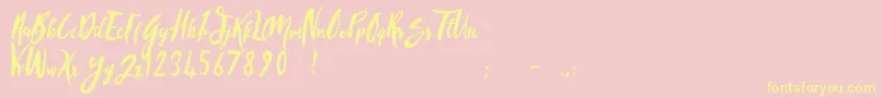 SandyliteRegular-Schriftart – Gelbe Schriften auf rosa Hintergrund