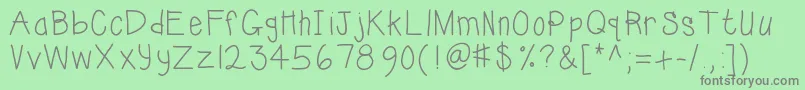 Kbsunshinebold-Schriftart – Graue Schriften auf grünem Hintergrund