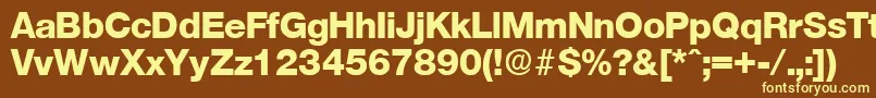 OlnovaExtrabold-fontti – keltaiset fontit ruskealla taustalla