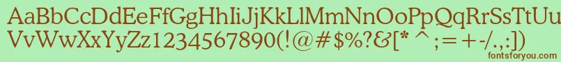 Osvaldlightc-fontti – ruskeat fontit vihreällä taustalla
