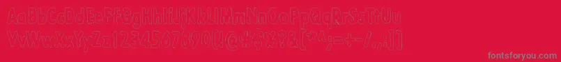 LazarusOzSyndfri-Schriftart – Graue Schriften auf rotem Hintergrund