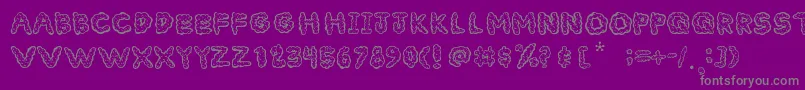 フォントCloudyFont – 紫の背景に灰色の文字