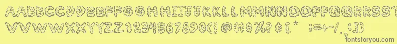 CloudyFontフォントについての詳細 フォントCloudyFont – 黄色の背景に灰色の文字